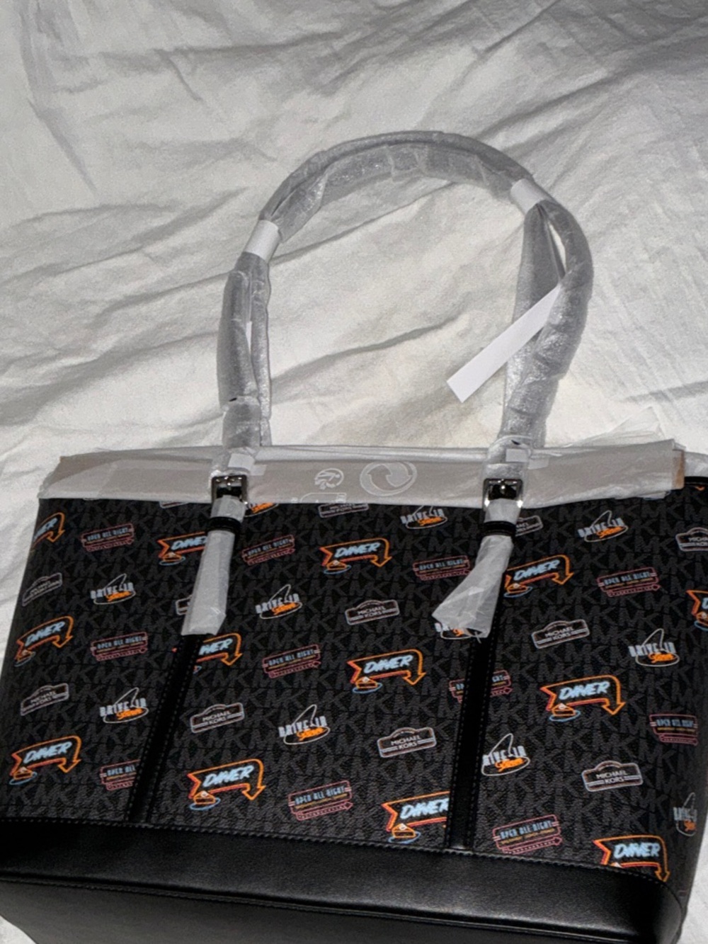 BNWT Michael Kors Black Logo Print Duffel with Multi-Color Diner Accents - Picture 4 of 5